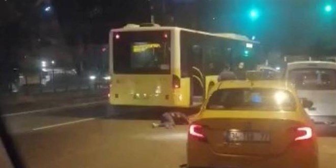 Taksici tartıştığı kadın yolcuyu otobüsün altına itti