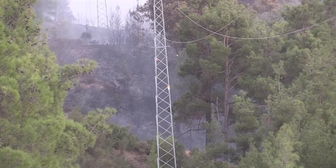 Orman yangınının söndürüldüğü bölgeye yakın konumda yeni bir yangın başladı