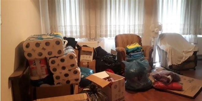 Depremzedeler için toplanan yardımları evine götürdü