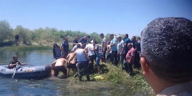 Çocuklarını kurtarmak isterken öldü