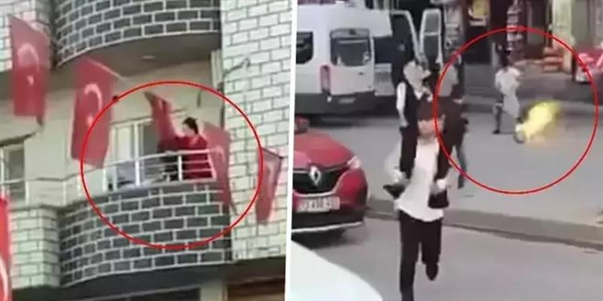Alev alan tüpü balkondan kalabalığın üzerine attı