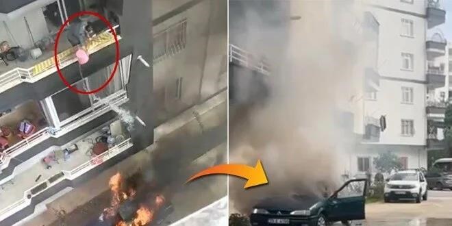 Yanan araca, balkondan kova ile su dökerek müdahale etti