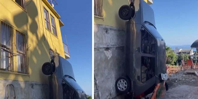 Kazaya karışan aracını iple binadan aşağıya sarkıttı