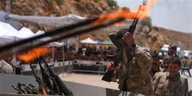 PKK'lı ilk grubun silahlarını yakması dünya basınında