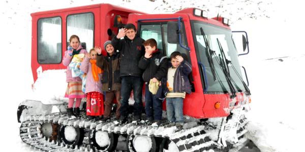 Kar üstü araçla köylerine ulaştılar