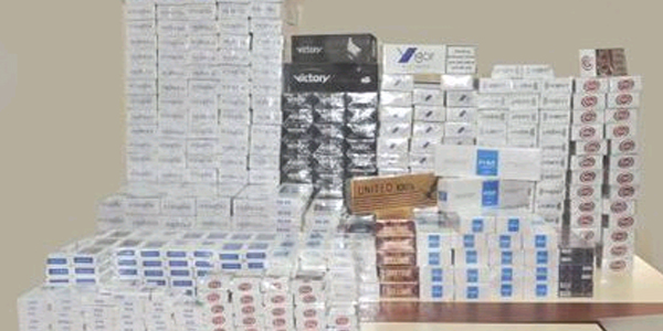 Askeri malzeme satan işyerinde 4 bin paket kaçak sigara