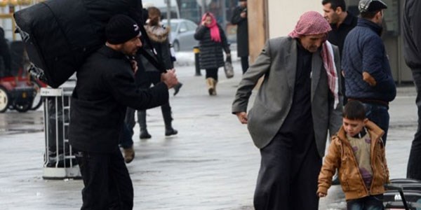 Suriyelilere 'geçici kimlik' verilecek