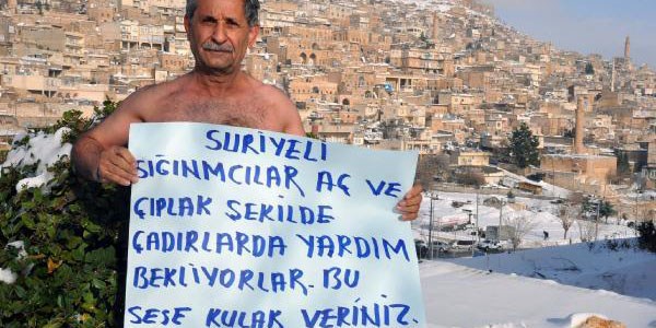 Suriyeli sığınmacılar için karda çıplak eylem