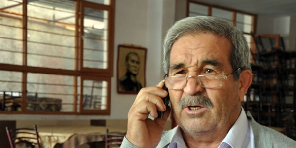 Muhtarın dolandırılmasını polis engelledi