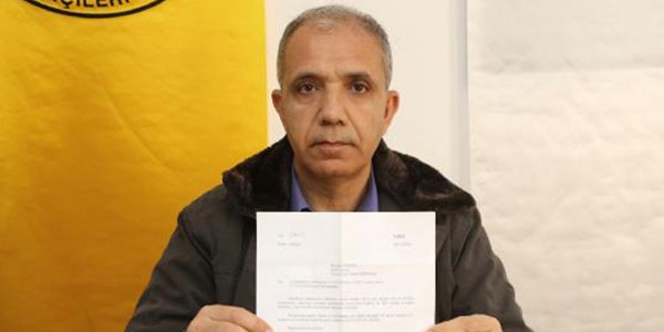 Tişört giyen memura uyarı cezası