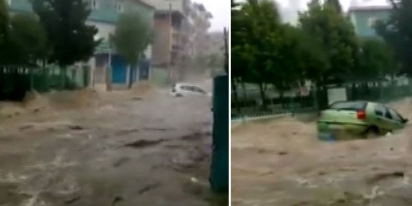 İzmir'de sel suları araçları sürükledi / Video