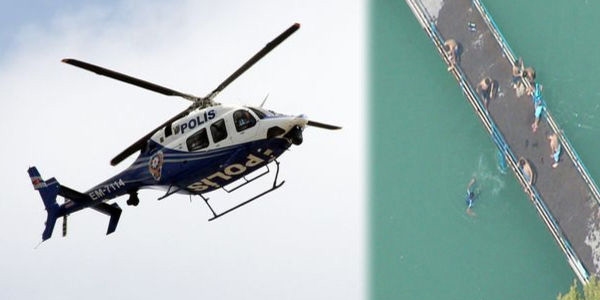 Kanalda yüzen çocukların helikopter destekli denetimi