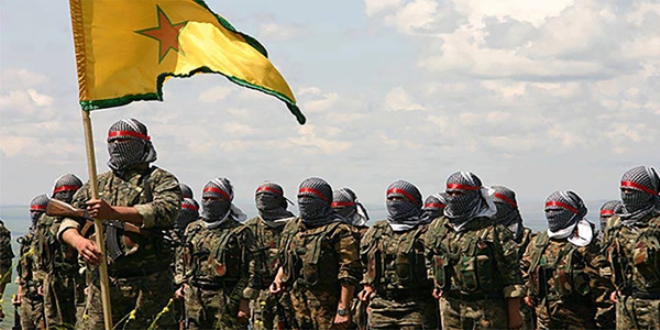 'PYD savaş suçu işliyor'