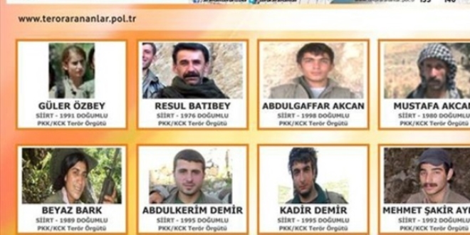 Aranan teröristlerin fotoğrafları billbordlarda
