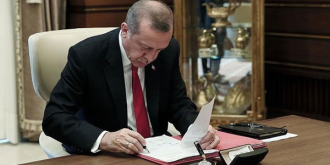 Erdoğan, 6701 ve 6703 sayılı kanunları onayladı