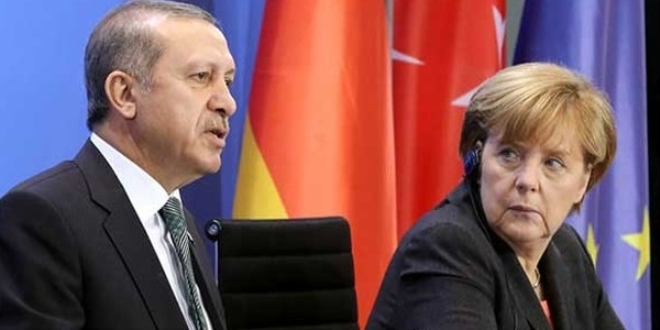 Erdoan, Merkel'e kayglarn iletti