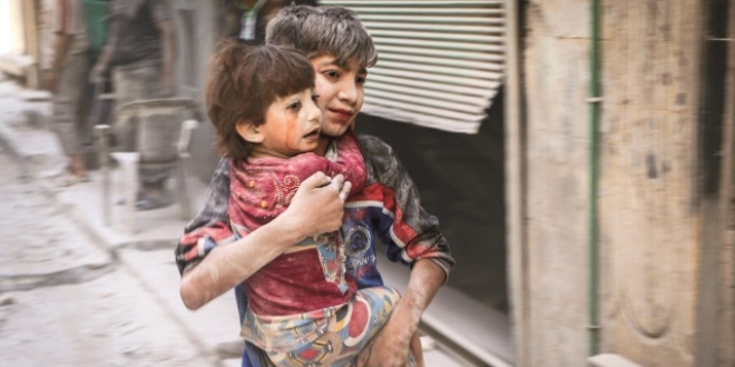 'Erdoan, Halep'te 200 bin kadn, ocuk ve yal'y katliamdan kurtard'