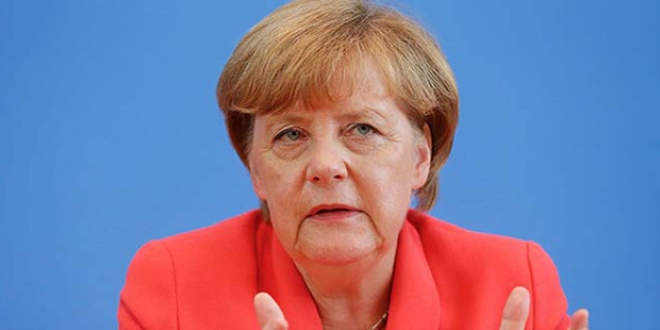 Almanya Babakan Merkel'den aklama