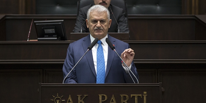 Başbakan: Çalışanlarımızın kazanılmış hakkına halel gelmesine izin vermeyiz