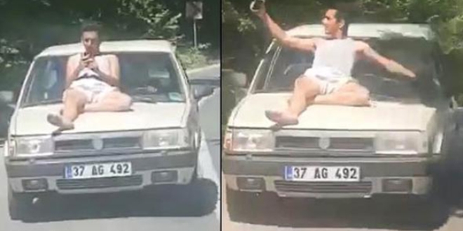 Otomobilin üzerine tehlikeli yolculuk