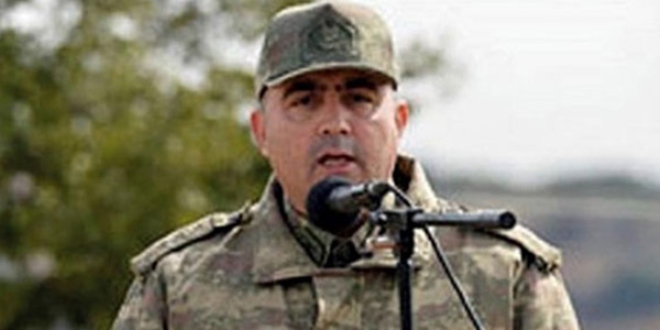 Eski komutana darbe suçundan beraat, örgüt üyeliğinden ceza
