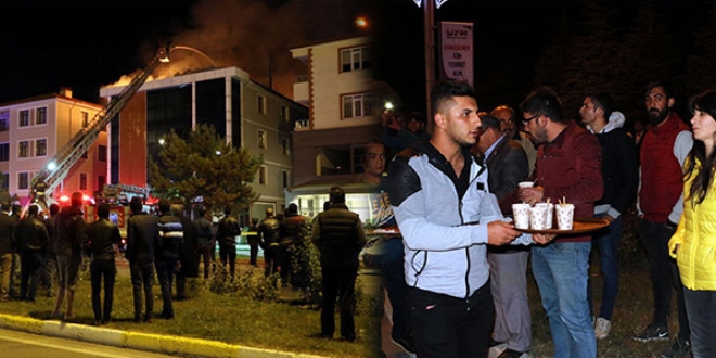 Yangını izleyenlere çay servisi