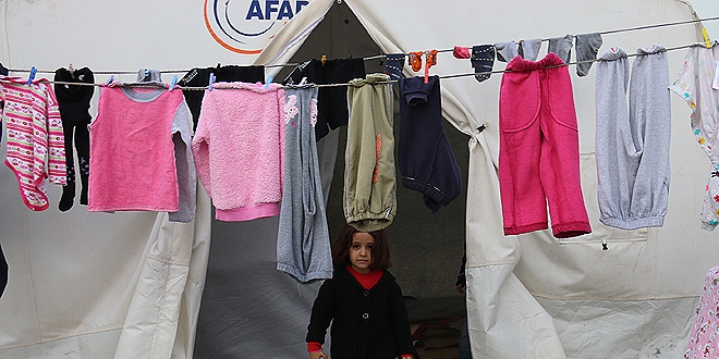 Başbakan'ın müjdesi depremzedelerin yüzünü güldürdü
