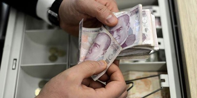 Vezne görevlisinin dikkati dolandırıcılığı önledi