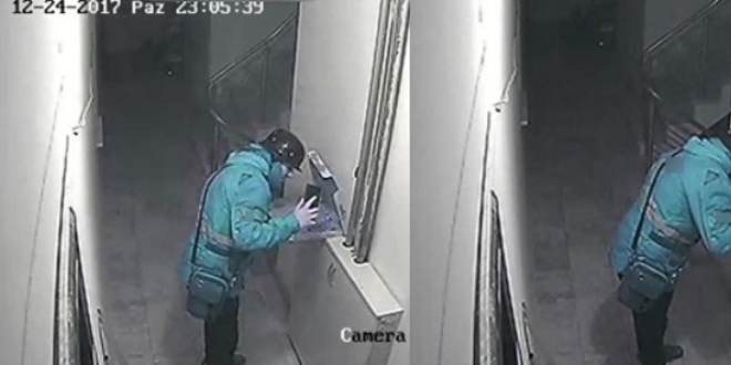 Kurye, pizzaya tükürürken güvenlik kamerasına yakalandı