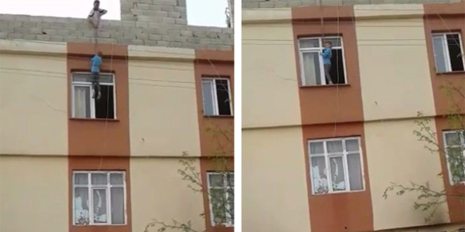 Çilingir çağırmak yerine küçük bir çocuğu iple damdan sarkıttı