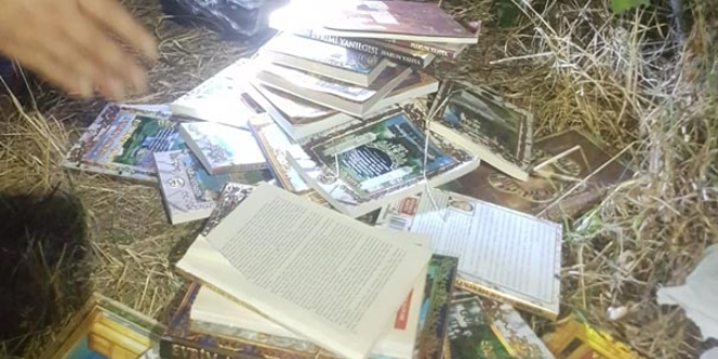Bağ evinde sokağa atılmış Adnan Oktar kitapları bulundu