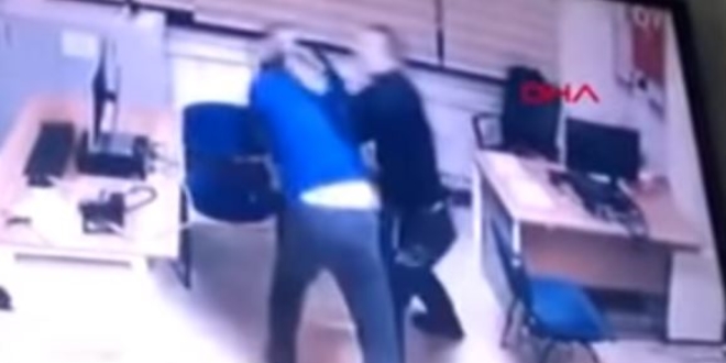 Sivil memur, polis memurunu demir çubukla yaraladı