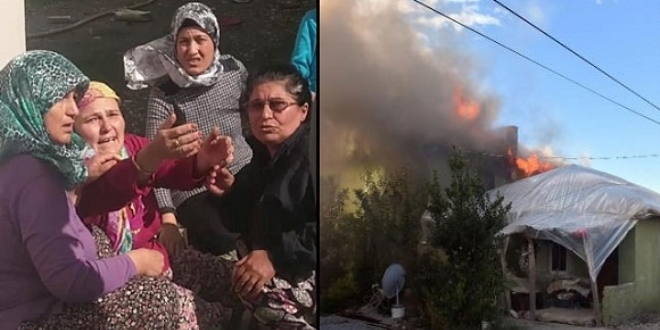Evinin yanışını gözyaşları içinde izledi