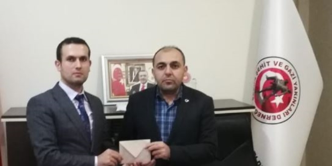 Milli Eğitim Müdürlüğü şefi aldığı para ödülünü şehit yakınlarına bağışladı