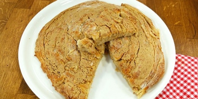 15 dakikada 9 tahinli pide yiyerek 10 altın kazandı