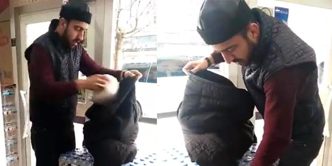 Poşete para vermemek için montunu poşet yaptı