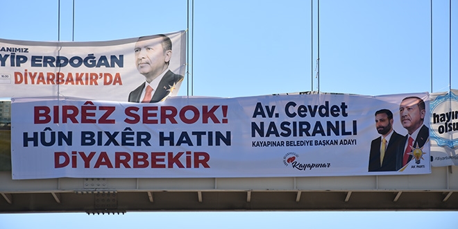 Erdoğan'a Kürtçe pankartlı karşılama