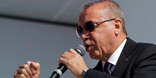 Erdoğan: Milli irade karşısında mum gibi olacaklar