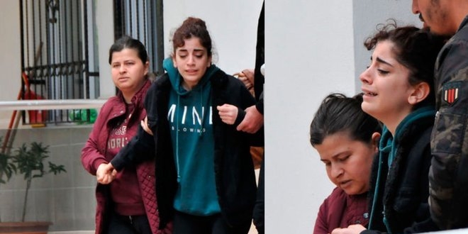 Evi yanan anne, ağlayan kızını teselli etti