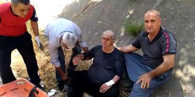 Mezarlık ziyaretinde atık su kanalına düştü