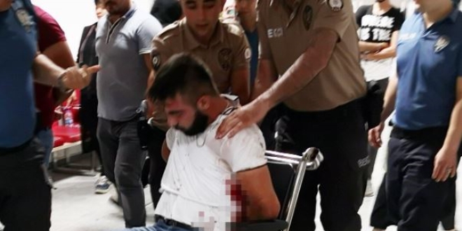Polisi yumruklayıp kendini kesen şüpheli tutuklandı
