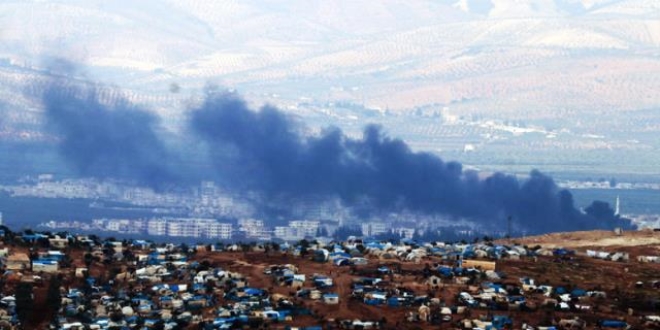 YPG'li teröristler SİHA'lara karşı lastik yakıyor