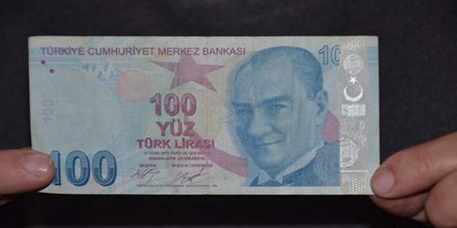 Kendisi 100 lira, deeri 100 bin lira