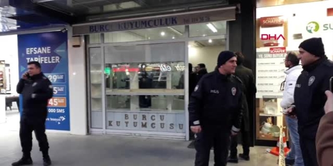 Kara çarşaflı soyguncuyu esnaf etkisiz hale getirdi