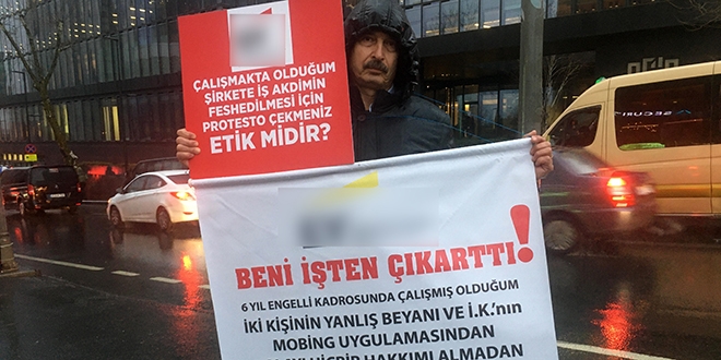 Tazminatsız kovulduğu iş yeri önünde tek kişilik eylem