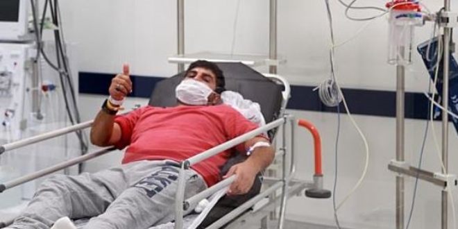 Özel uçakla getirilen Emrullah Gülüşken, taburcu edildi