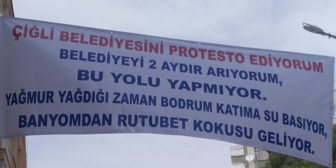 Pankart yapıp sokağa asan vatandaşın sorununu belediye çözdü