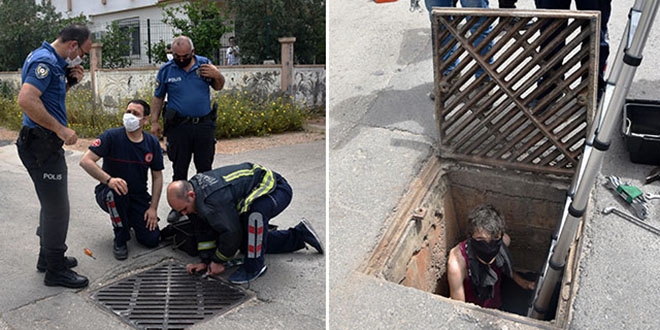 Karantinadaki mahalleye girmek isterken kanalizasyonda sıkıştı