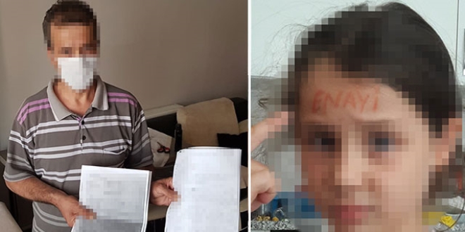 Kızının alnına 'enayi' yazıp fotoğrafını gönderdi