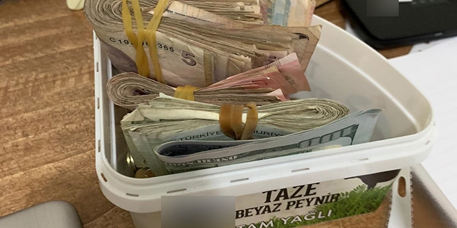 FETÖ üyeleri paraları peynir kabında saklamış
